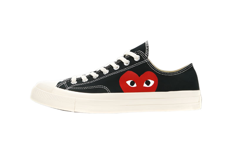 Converse Chuck Taylor Low CDG Black sneaker with red heart logo on black canvas upper