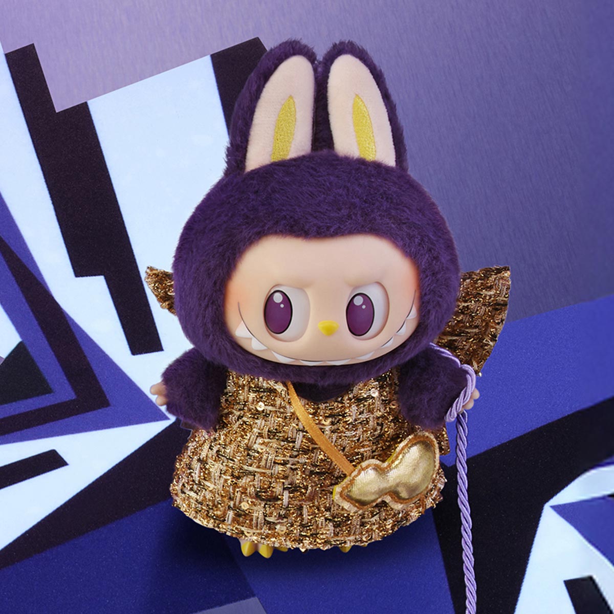 Side profile of Labubu Wings of Fortune figure showing gold wings