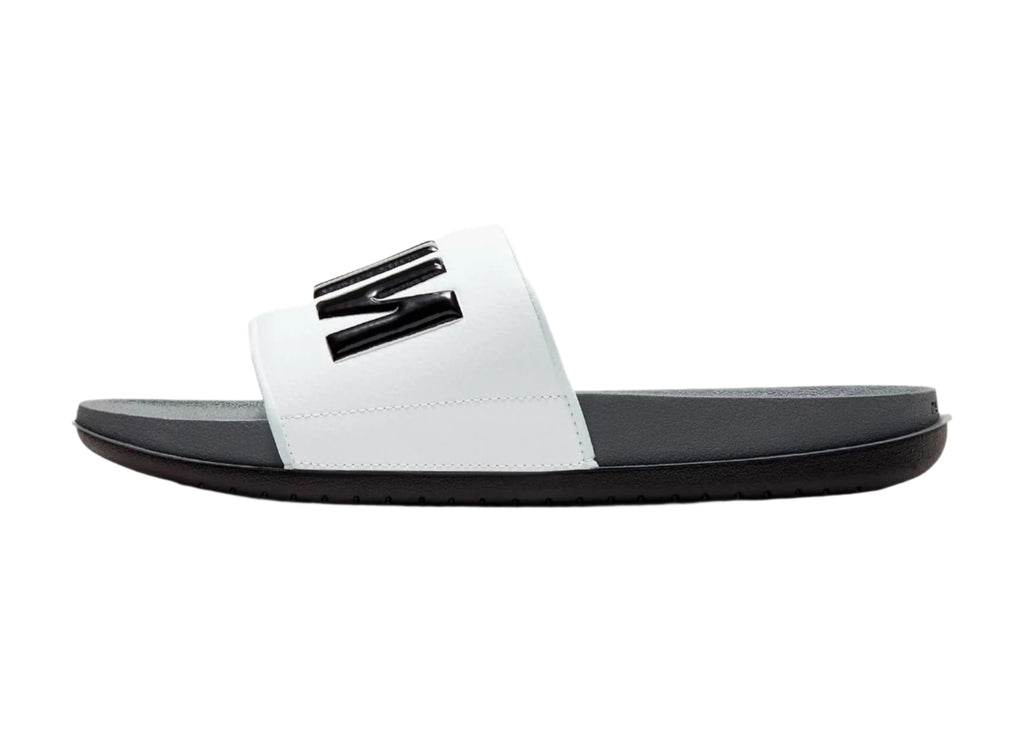 Side view of Nike Off-Court Slides in White