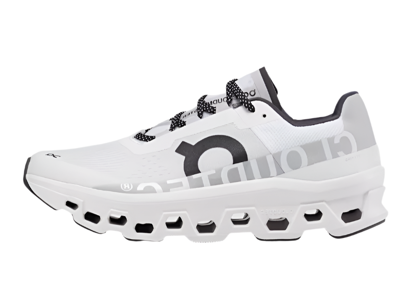 Side view of On Cloudmonster All White running shoes
